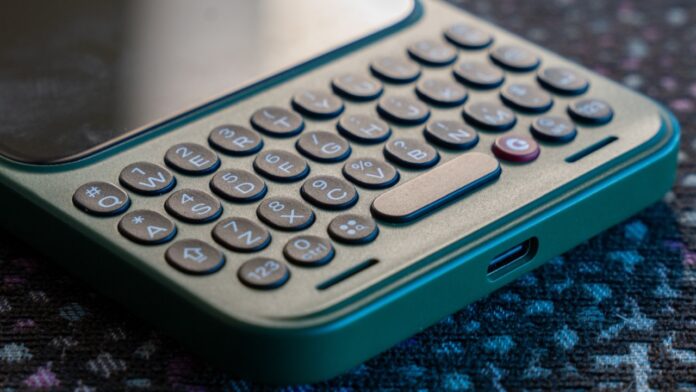 Retro-style mobile phone keyboard with round keys and compact layout design