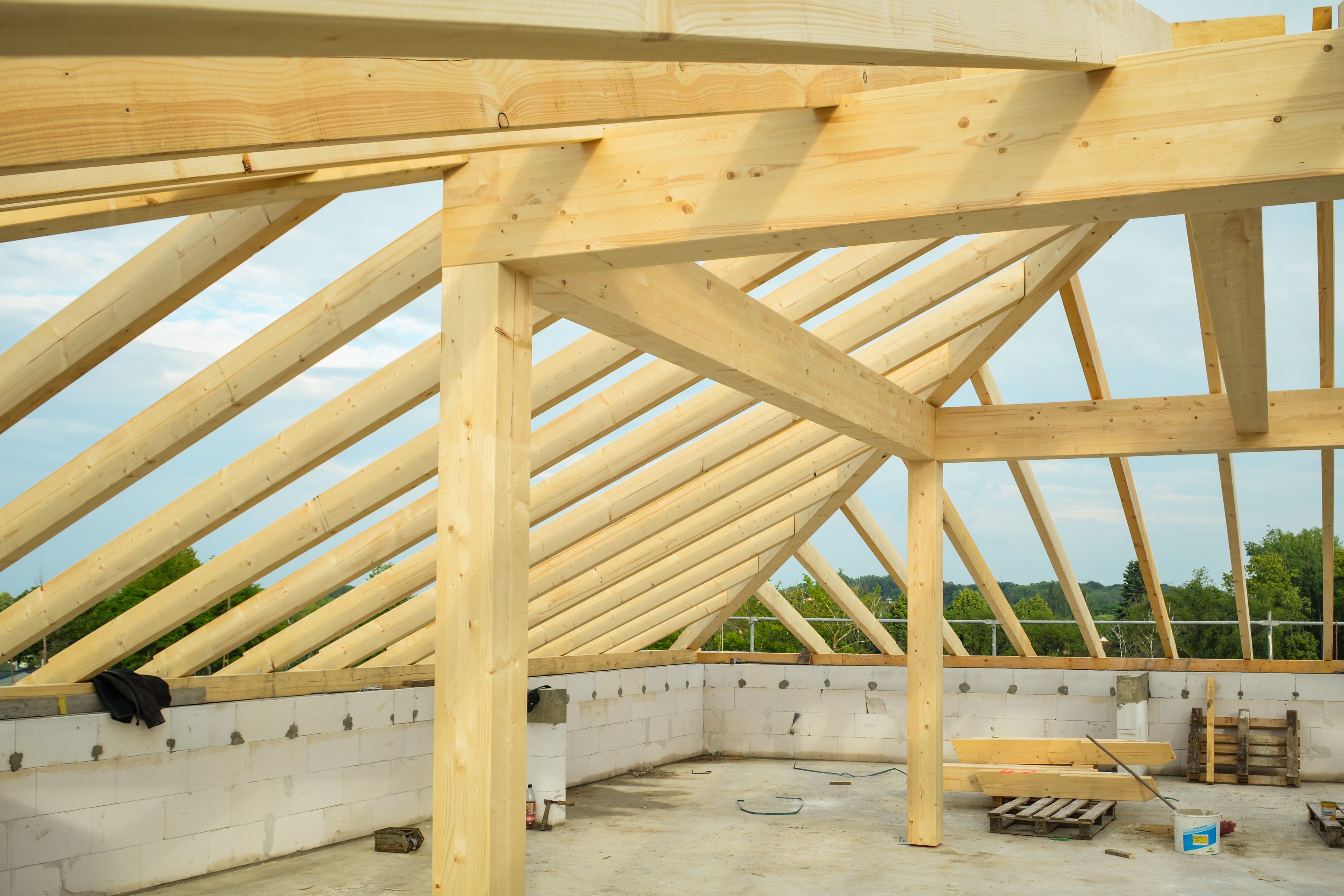 Wooden structural trusses in an unfinished building